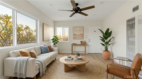 Photo of 3446 Hillcrest Drive, Los Angeles, CA 90016 (MLS # DW26068736)