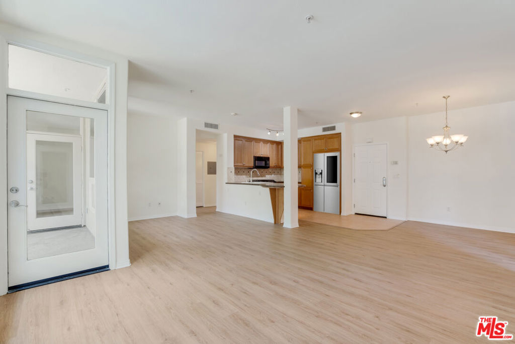 One of a kind spacious one bedroom home with two expansive balconies located in the heart of Playa Vista! This single level residence is open and airy with a great kitchen layout that flows into the dining room and living space. This home offers an incredible amount of windows for an abundance of natural light. Enjoy direct access to the home from the street making it easy to bring in groceries or head out through the neighborhood. Listen to the beautiful concerts at Concert Park from one of your two private balconies! Directly in front of a huge window looking out to the oversized patio is a flex space that could easily be an office, den or play-area! This home has been lovingly cared for with beautiful upgrades. Two parking spots in the secure garage. Close to Playa Vista Centerpointe Club's gym, pool, spa and screening room. Nearby, Runway at Playa Vista is home to Whole Foods, Cinemark movie theater, restaurants, farmer's market, shops and more! Includes access to the brand new Resort fitness center as well as water, trash, basic cable, internet, gas, and 24hr neighborhood security.