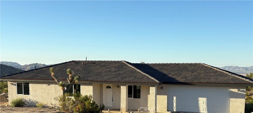 New Construction home with a spectacular view. Three bedrooms, two bathrooms, 1270 sq feet with oversized 20x20 garage. Indoor laundry area.  Two full bathrooms, master bedrooms have his and her closets. Spacious kitchen with dining room area.  Special 0 down financing available.