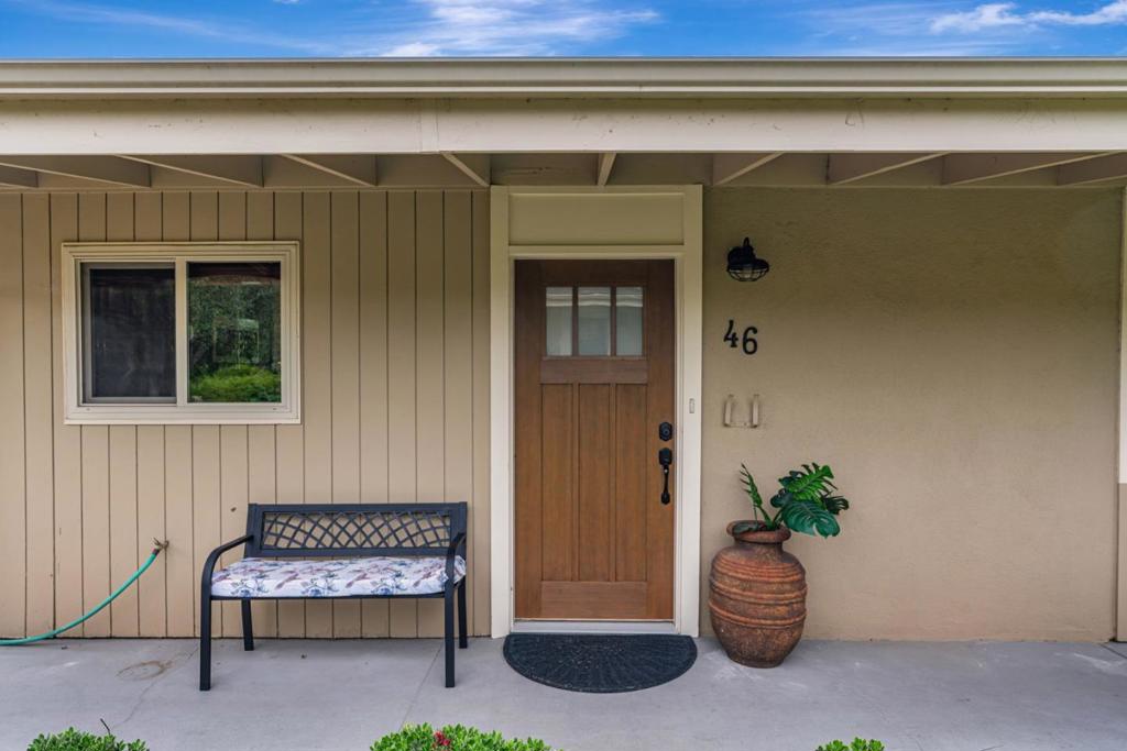 Terrific two bedroom, two bath end unit with parking right in front of your patio gate! This location is perfect for not only convenient parking but also close proximity to the club house, restaurant, pool and library. Updated kitchen, new floors and beautiful custom pantry doors. The patio is extra special with washer/dryer in shed, additional storage cabinets and a second shed with electricity if you need another refrigerator or freezer. Well priced and ready for you to begin living the extraordinary Hacienda lifestyle!