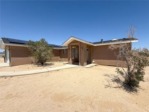 Photo of 74804 Amboy Road, 29 Palms, CA 92277 (MLS # JT25261203)