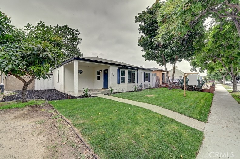 This move-in ready 2-bedroom, 1-bath home has been completely remodeled and is located in a well-maintained neighborhood. The exterior features new stucco, fresh sod with automatic sprinklers, dual-pane windows, and a finished 2-car garage, all surrounded by mature fruit trees. Inside, the home offers new waterproof flooring, recessed lighting, upgraded baseboards, and fresh paint throughout. The bathroom has been fully renovated down to the studs, and the modern kitchen is equipped with sleek black cabinets and beautiful quartz countertops, making this home both stylish and functional.