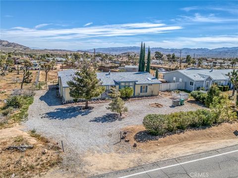 Photo of 4837 Avalon Ave, Yucca Valley, CA 92284 (MLS # JT26057601)