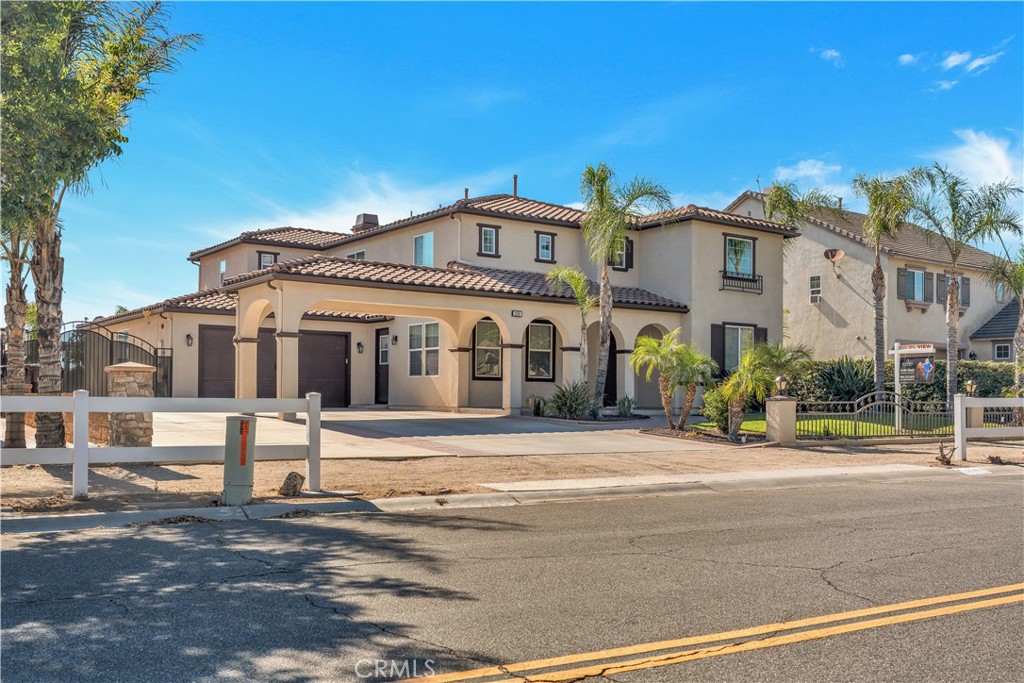 Welcome to Norco Ridge Estates – Where Luxury Meets Horse Property Living!
This beautifully updated 5-bedroom, 3-bathroom home offers over 3,300 sq. ft. of well-designed space with fresh interior paint, hardwood floors, and eye-catching 18” diamond-pattern tile. Soaring cathedral ceilings greet you, leading into a formal dining room with a convenient butler’s pantry and a spacious kitchen featuring granite counters and custom backsplash.
The home includes a downstairs bedroom and full laundry room with sink and storage, plus an upstairs built-in desk/workstation and a master suite with breathtaking views, dual walk-in closets, and a large jacuzzi tub.
Step outside to your private resort: a sparkling pool with waterfall spa, fire pit, artificial turf, a putting green, and retractable child safety gate. The oversized RV driveway (approx. 15’ x 90’) has 50-amp power and a direct sewer hookup. It is a short golf cart ride to Hidden Valley golf course.
Horse lovers will appreciate the custom 4-stall barn with automatic waterers and fans, a 50’ x 50’ turnout, wash racks, and two additional pipe stalls—fully separate from the pool area for peace of mind. Just a 10 minute ride or walk to Ingalls Park Event Center as well as Pumkin Rock.
Enjoy covered parking, panoramic views of city lights and mountains, and room to live the lifestyle you’ve been dreaming of.