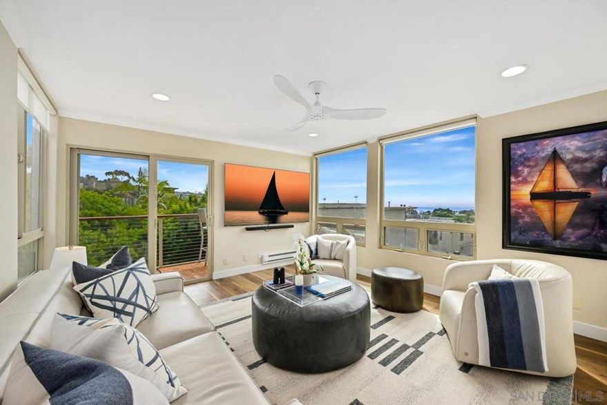 Sparkling ocean views in the heart of the village of La Jolla! Experience coastal living at its finest in this exquisite residence - the only unit in the building featuring dramatic oversized windows that capture sweeping ocean panoramas and unforgettable sunset views. Flooded with natural light, every room showcases the beauty of La Jolla’s coastline, creating a serene retreat in the center of one of Southern California’s most sought-after neighborhoods, where you're just steps away from world-class beaches, dining, shopping, and top-rated schools. Enjoy a bright, open floor plan with a beautifully updated kitchen and a spacious living area that opens to a sweeping balcony – the perfect spot to relax and take in breathtaking sunsets. Recent upgrades include newly replaced upper windows and modern ceiling fans. Additional conveniences include in-unit laundry, secure underground parking, and elevator access.  Plus, you're only half a block from the popular Sunday La Jolla Farmers Market and adjacent to a public parking lot for visiting guests. Live the ultimate village lifestyle – where every day feels like a vacation.