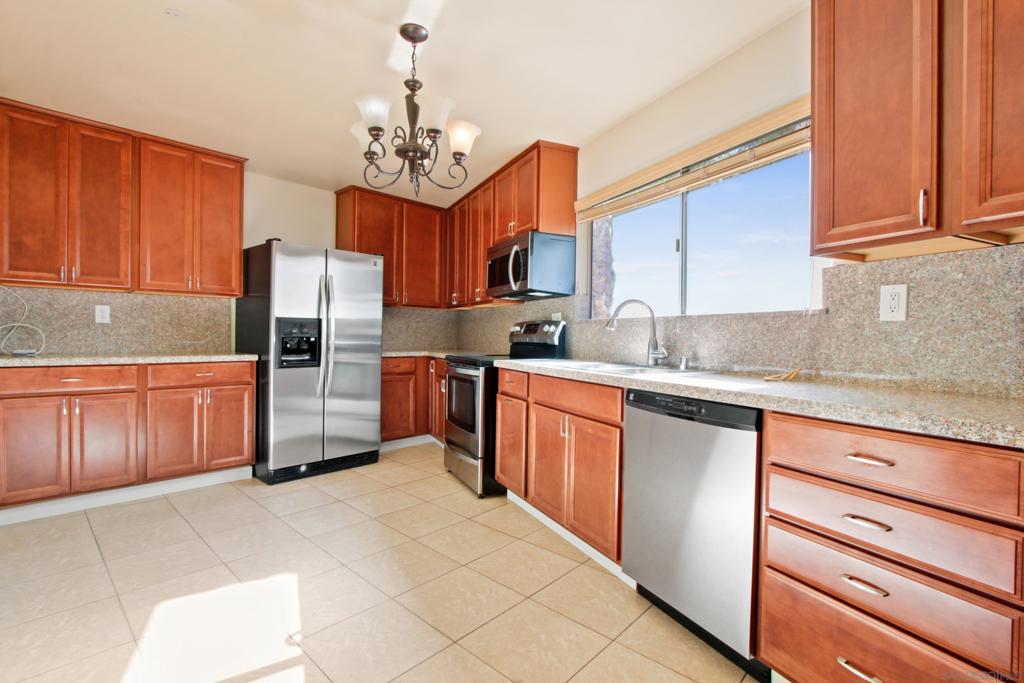 Located in the prestigious area of Rancho Palos Verdes, walking distance to Peninsula Center and Peninsula High School. Desirable top floor end unit, with windows and sliding glass door on three sides. Very clean, open & spacious living area. Light & bright upgraded kitchen with newer appliances and granite counters, The living room has nice cozy fireplace and large deck overlooking community pool. Light & bright kitchen with breakfast counter. Large dining area, 2 nice-sized bedrooms - Primary has en-suite bathroom and plenty of closet space. Great complex, very well maintained, gated. Underground parking with an elevator. Close to all amenities and easy commute to anywhere in the South Bay. Move in condition & priced to sell!!