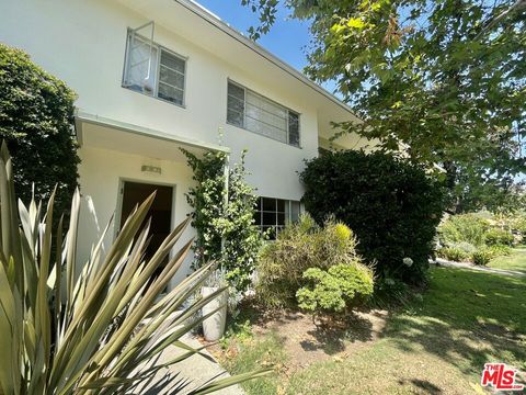 Photo of 5205 Village Grn, Los Angeles, CA 90016 (MLS # 25606751)