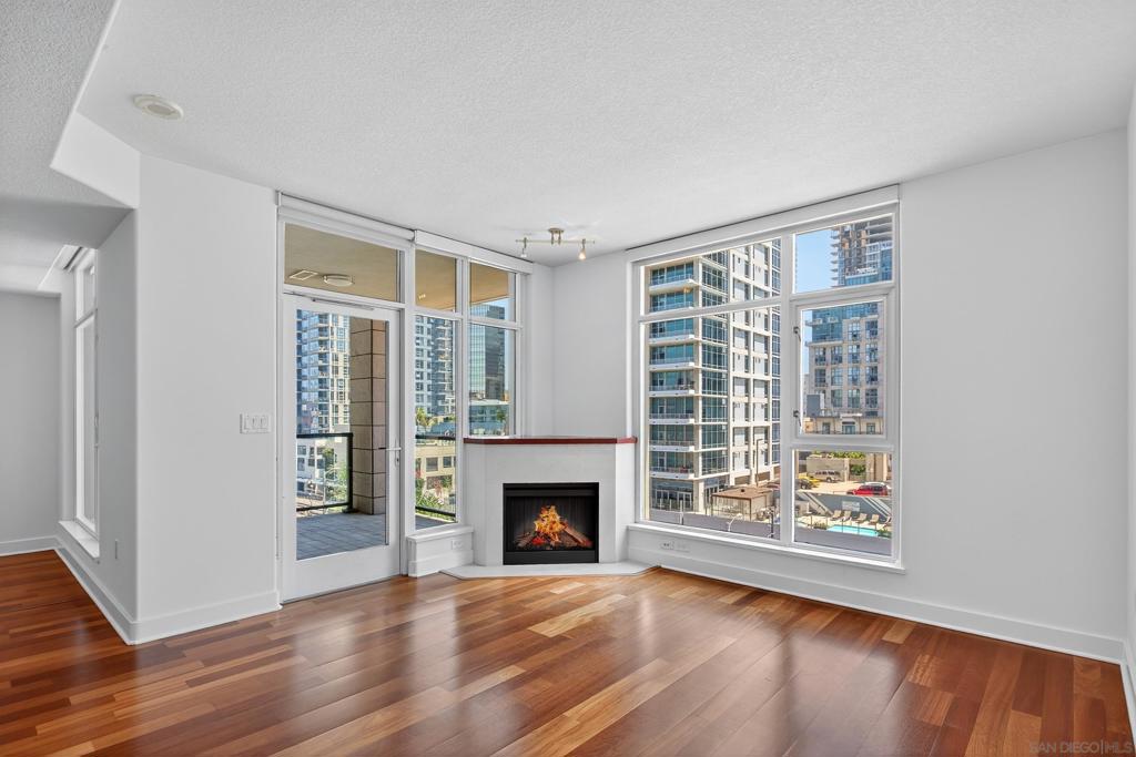 Enjoy modern urban living in this bright and open 1-bedroom, 1-bath condo located in the heart of downtown San Diego. It features an open floor plan with plenty of natural light, a contemporary kitchen with stainless steel appliances, and in-unit laundry for added convenience. The unit also comes with 1 dedicated parking spot for your convenience. Residents enjoy resort-style amenities including a pool, spa, steam room, sauna, gym, 24/7 concierge, community room, and amazing monthly community events. Perfectly situated close to dining, entertainment, and public transit, this unit offers the ideal balance of comfort and location. Central AC keeps you cool year-round. Don’t miss the chance to live in one of Downtown San Diego’s most sought-after high-rises!