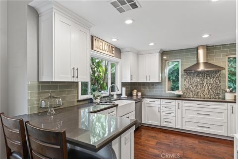 Photo of 21212 Country Farm Ln, Rancho Santa Margarita, CA 92679 (MLS # OC25247884)