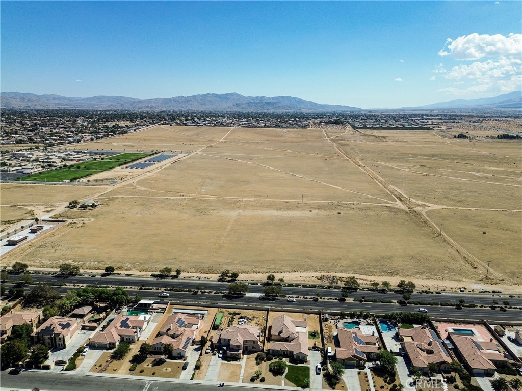 ***PRIME LOCATION FOR THIS RARE 78.7 ACRE SITE FOR FUTURE DEVELOPMENT IN THE HEART OF APPLE VALLEY!***Of the 78.7 Acres, +/- 19.7 Acres is zoned commercial with frontage on highly traveled Apple Valley Rd. 26.8 Acres zoned OP, and 32 Acres zoned RSF. Note, the Town of Apple Valley has indicated an interest for development at this location and would consider a Specific Plan over the parcel and adjoining parcel. In addition, the adjacent lot is 19.7 acres zoned commercial and if purchased together would create a nearly 40 acre commercial site, along with the remaining acreage suitable for office, professional, medical and single family homes at the Eastern portion of the property. The development opportunities for this land is unlimited with the parcel large enough to accommodate nearly any commercial development at one of the most desirable areas in the High Desert. All utilities, including sewer are available and there are no joshua trees on the property to impede any development. Schools, churches, shopping, restaurants, medical facilities, etc. are all very close, Incredible location in the path of major, new growth and a perfect location for a medical or educational campus, retail center with major anchor tenants, etc.