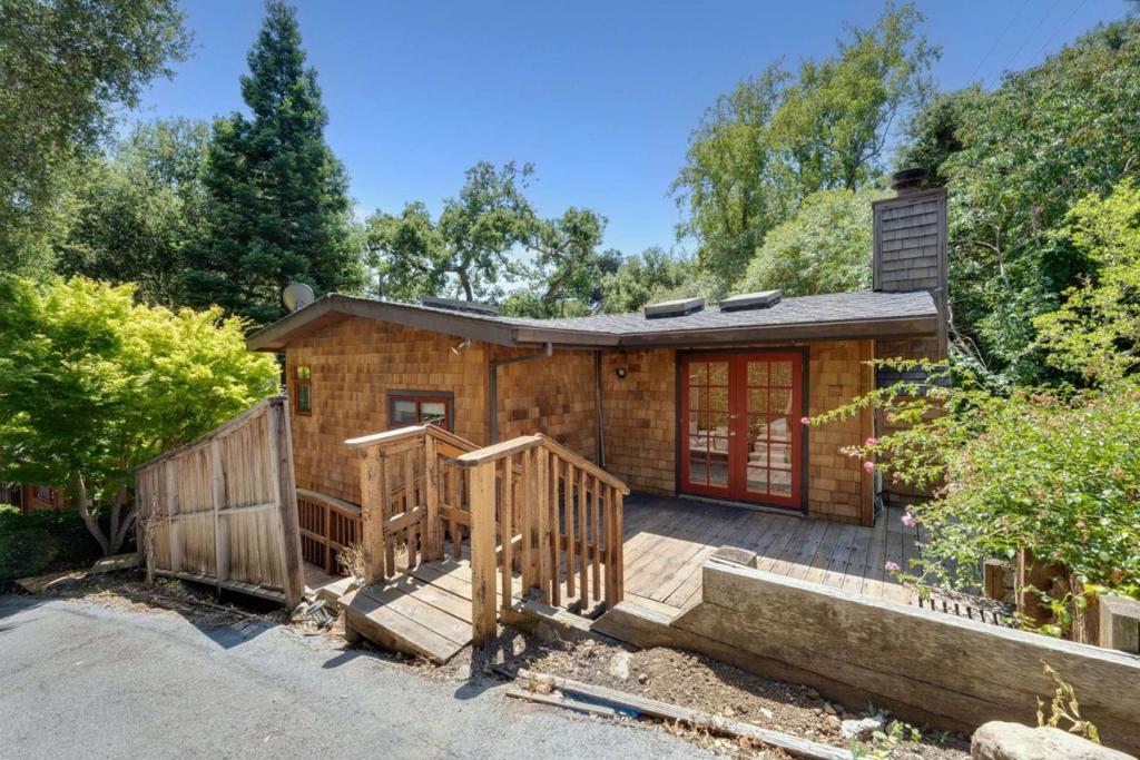 Rare opportunity in one of Menlo Parks most sought-after neighborhoods. Built in 1954 & set on a generous 14,625 sq. ft. lot, this distinctive property offers exceptional flexibility with three separate living units perfect for multi-generational living, rental income, or future redevelopment.The home provides approximately 1,515 sq. ft. of living space, thoughtfully arranged across three units: - Lower Unit: 2-bedroom, 1-bath, 572 sq. ft. with a skylit primary bedroom & an open-concept living area. - Middle Unit: 491 sq. ft. bright studio with a built-in Murphy bed, skylights, & a spa-like bathroom featuring a soaking tub. - Upper Unit: 452 sq. ft. spacious studio, including a dedicated office/workspace, extensive built-in cabinetry, & access to a private deck. Detached 2-car garage with storage, refinished hardwood floors, & modernized fixtures. Tucked among mature trees & surrounded by multi-million-dollar homes. Alpine offers exceptional privacy in a peaceful setting backing onto San Francisquito Creek. Prime location is just minutes to Stanford University, Downtown Menlo Park, Sand Hill Rd, & the award-winning Las Lomitas School District. Easy access to I-280, local parks, & a vibrant mix of dining & shopping, the home offers the perfect blend of serenity & convenience.