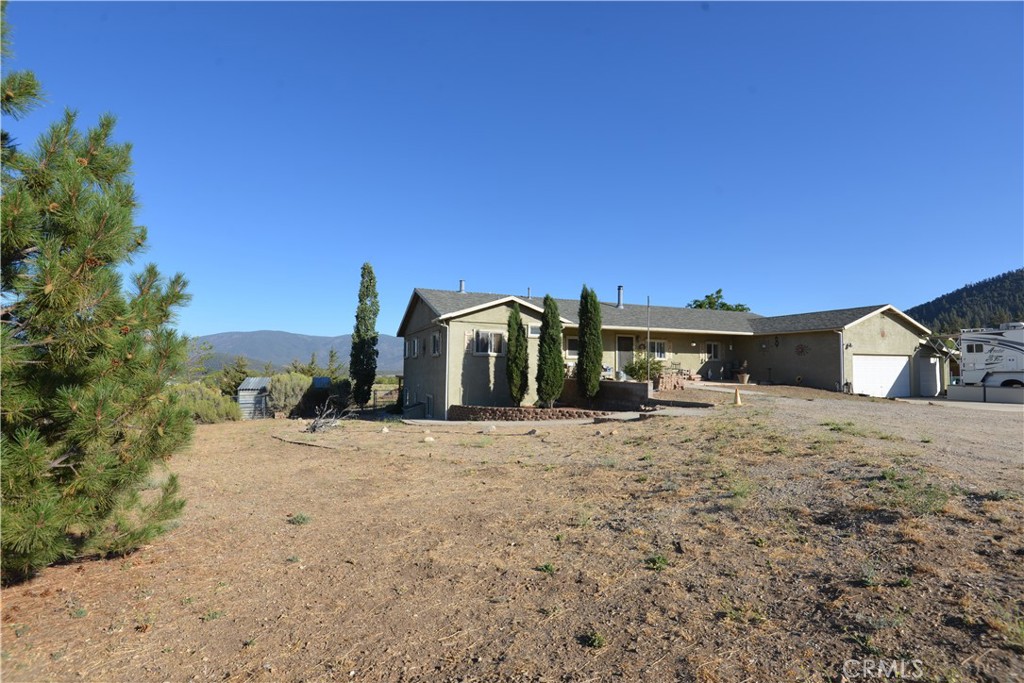 BEAUTIFUL Cuddy Valley horse property with panoramic views and income potential. The main living space offers 4 bedrooms, and two full baths with a large open kitchen area that will delight any culinarian, to include a 6 burner professional style range. There is an additional room being used as an office. An expansive partially covered deck is accessed off both the kitchen and living room, perfect for taking in the amazing views. Downstairs there is approximately 1000 square feet of finished space which includes a living room, bunk bed area, bedroom, two bathrooms, dining area, and kitchenette, which can be accessed from the main living area, but also has separate exterior access. A nice covered patio welcomes you to the outside entrance. This downstairs is currently being used as a successful Airbnb, and would also be perfect for extra family members or guests. Outdoors there are numerous corrals and shelters for your horses or other farm animals. Currently the owner offers horse boarding, including as part of the Airbnb, so guests can bring their own horses! Easy access to the National Forest makes this a great place to ride or hike. The home comes with a whole house Generac generator for convenience and peace of mind. This is country living at it's finest all within less than an hour from Bakersfield or Santa Clarita.