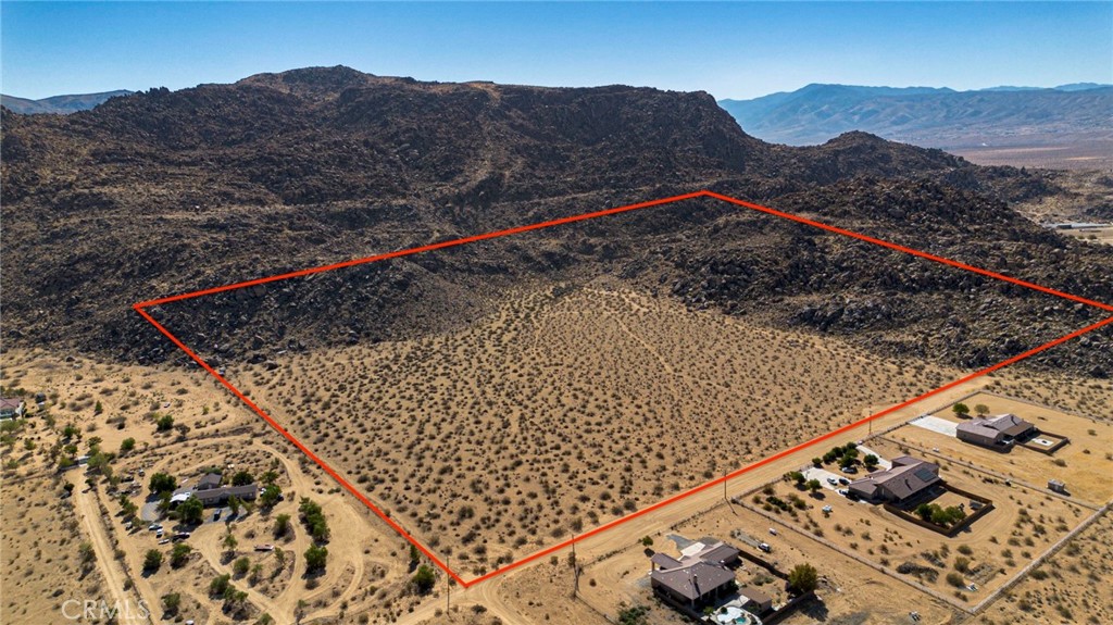 Discover 40 acres of breathtaking land nestled in the heart of Apple Valley, surrounded by majestic mountains and massive natural boulders. This property offers absolutely stunning panoramic views in every direction, making it the perfect setting for your dream estate, retreat, or investment.
The land is subdividable (Buyer to verify), providing flexibility and opportunity for future development. Located in the county area, zoning is very accommodating—allowing you the freedom to build nearly anything you envision, from a custom residence to a large garage or warehouse (Buyer to verify). Most of the acreage is buildable, offering incredible potential for a wide range of uses.
This is truly a one-of-a-kind opportunity to own an exquisite, prime piece of land in Apple Valley. With its unmatched natural beauty, expansive views, and versatile possibilities, it’s a rare find you don’t want to miss.