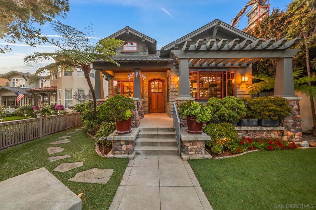 Welcome to this stunning Coronado Craftsman home with guest casita located only 1 block from the famous Coronado Beach! Beautifully remodeled. Step inside and be greeted by the intricate woodwork, spacious living areas, and flooded with natural light, highlighting the craftsmanship and attention to detail that defines this home. The chef's kitchen is a masterpiece, featuring custom cabinetry, high-end appliances, and double kitchen islands. The adjacent dining area opens up to a serene outdoor space, perfect for al fresco dining and enjoying the coastal breeze. Detached 2 bed 2 bath guest casita. Ally access with a 2.5 car garage!