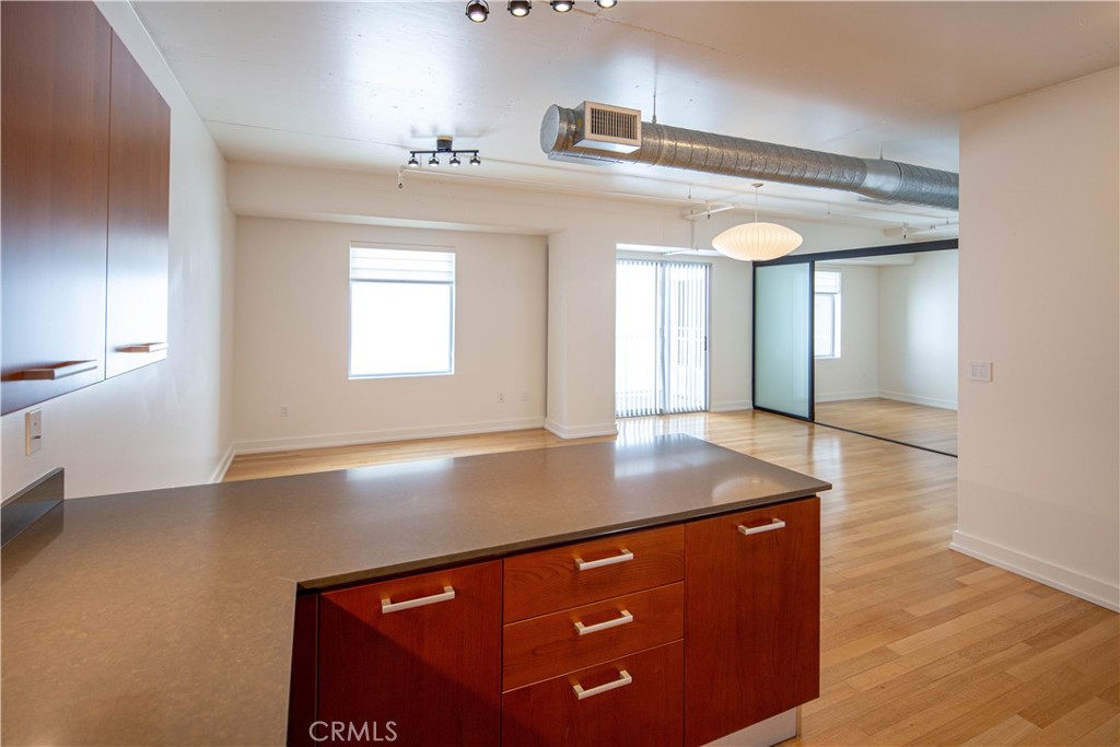Welcome to Unit 434, a move-in ready 1-bedroom, 1-bath loft offering 790 sq.ft. of open-concept living space in the vibrant DTLA South Park neighborhood. Built in 2006, this unit above Ralph's supermarket showcases urban lifestyle with excellent HOA amenities such as pool, fitness center, and 24 security concierge.
This unit also features several hardwired ethernet ports available in various locations throughout the unit and a combo washer/dryer unit in the closet! Airy with a balcony featuring peekaboo city view and convenient Unit 434 is also within steps of public transit, dining, entertainment, and cultural landmarks. Whether seeking your first home or expanding your downtown portfolio, Unit 434 combines value, location, and convenience in one incredible package.