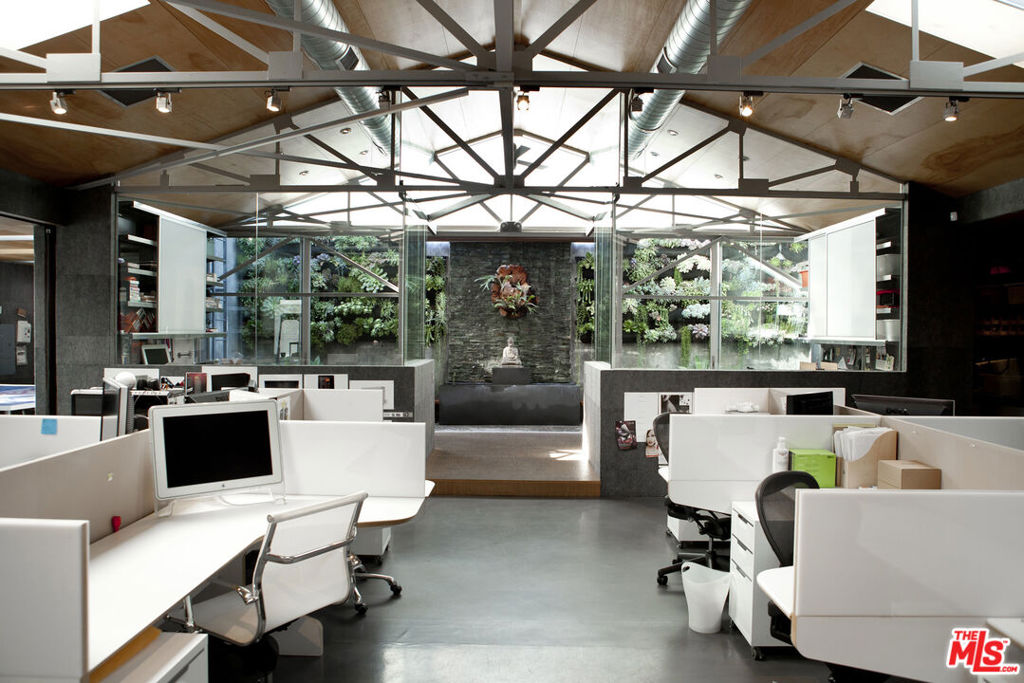 Step into a unique creative office space located in the heart of West LA, just north of vibrant Downtown Culver City. This boutique property blends functionality and style with high vaulted ceilings, an abundance of natural light, and a flexible layout that includes two private offices, a conference room, open workspace, a full kitchen, two restrooms, and a private outdoor patio ideal for brainstorming sessions or casual breaks. Perfectly positioned with easy access to the Expo Line, 405, and 10 Freeways, this centrally located space places you within minutes of major studios like Sony, Amazon, and Culver Studios. The neighborhood buzzes with energy, surrounded by top-tier amenities including Equinox, Trader Joe's, In-N-Out, Cafe Vida, and The Garage on Motor, to name just a few. Available for immediate occupancy, this property offers a rare blend of convenience and creative potential. Tenants are responsible for their own utilities, including janitorial, electricity, and trash services. All uses are subject to City approval.