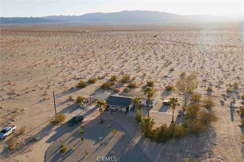 Photo of 83683 Amboy Road, 29 Palms, CA 92277 (MLS # JT26064336)