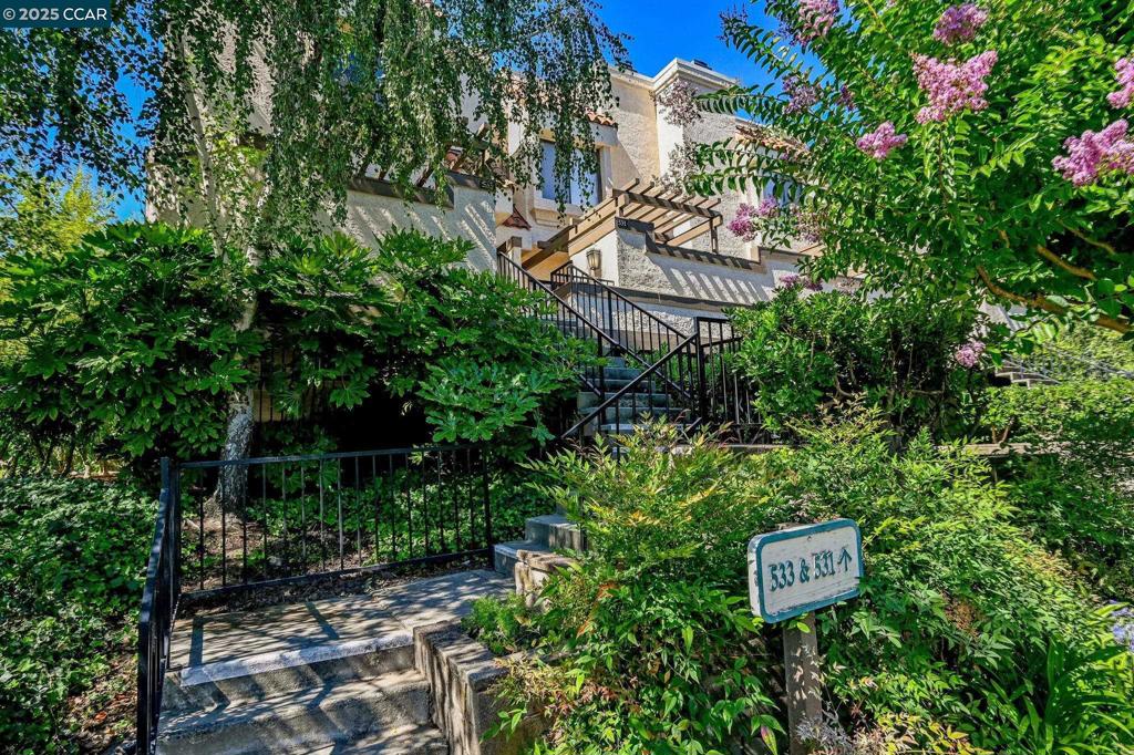 Perfectly situated near downtown Walnut Creek, BART, and trails, this beautifully updated and gorgeous end-unit townhome offers a light-filled layout and ultimate convenience. Featuring two spacious en-suite bedrooms with vaulted ceilings, 2.5 baths, and approx. 1,187 sq ft, this home blends comfort and style. Enjoy stunning floors throughout, and an inviting open kitchen overlooking a private patio—ideal for relaxing or entertaining. The living room boasts a gas log marble fireplace and abundant natural light. Additional highlights include in-unit laundry, skylight, spacious closets, and central HVAC. Two private patios offer outdoor storage and privacy. Community amenities include a pool, spa, tennis court, greenbelt, guest parking, and secure underground garage. Top-rated Walnut Creek and Acalanes schools (buyer to verify). This is the one you’ve been waiting for!