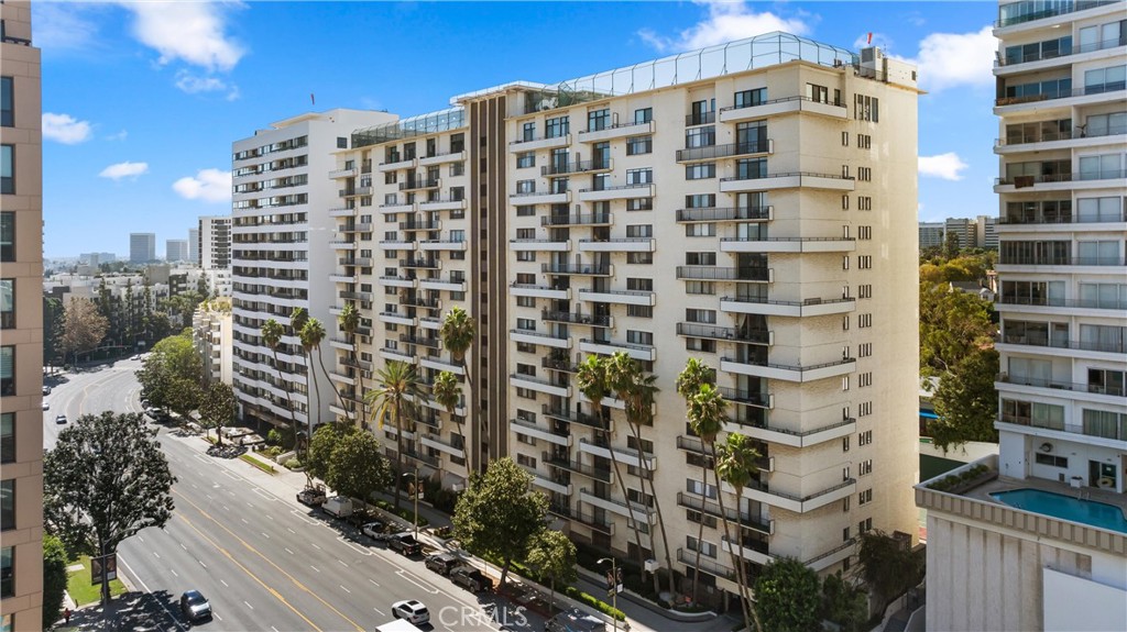 Welcome to Wilshire Marquis – a sought-after full-service building offering luxury, convenience, and resort-style amenities in the heart of Westwood. This beautifully maintained 2-bedroom, 2-bathroom residence spans 1,037 square feet and features a bright, open layout designed for both comfort and style. The spacious living area flows seamlessly into a private balcony—perfect for morning coffee or evening relaxation. The kitchen is equipped with granite countertops, stainless steel appliances, and ample cabinetry, opening to a dining area ideal for casual meals or entertaining guests. The primary suite offers a generous walk-in closet and an updated en-suite bathroom with sleek finishes. The second bedroom is well-proportioned and filled with natural light, with a second full bathroom conveniently nearby. Additional highlights include in-unit laundry, central heating and air conditioning, and two assigned parking spaces. Residents of Wilshire Marquis enjoy 24-hour security and concierge services, a heated Olympic-sized pool and spa, three tennis courts (including two rooftop North-South courts), a fully equipped fitness center, dry sauna, clubhouse, and outdoor BBQ and picnic areas. Just moments from UCLA, Westwood Village, Century City, and Beverly Hills, this prime location offers easy access to top dining, shopping, and entertainment, as well as the 405 and 10 freeways. Experience the perfect blend of luxury living, modern convenience, and an unbeatable Wilshire Corridor address.
