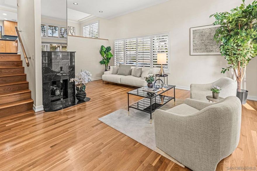 This 1720SF pristine END UNIT townhouse with extensive views and upgrades is in an estate situation and priced to sell! As an additional bonus, the original owners elevated every space with premium finishes and clever touches that make daily living both comfortable and inspiring, providing you with a sparkling move-in condition that can be shown on short notice! The main level entry welcomes you with newly refinished white oak hardwood floors and custom small-pane sliding glass doors that flood the space with natural light. The fireplace, once ordinary brick, now commands attention with sleek black marble and a remote-control start. The living room flows seamlessly to a private patio, perfect for BBQs and entertaining, while an arched doorway leads to the two-car garage complete with washer and dryer. A mirrored powder room — inspired by a famous New York restaurant — makes a great conversation piece. Rare for this complex, the home features a full circulating heat and air conditioning system, recently upgraded with a brand-new HVAC. The dining area includes a built-in bar with granite countertop and sink, ideal for hosting friends and family. The oversized kitchen is a showstopper, surrounded by picture windows with views of mature landscaping, the tennis courts, and pool. Morning sun pours in, creating a warm, energizing start to your day.  There’s ample space for a casual seating area, home office, or reading nook, with built-in cabinetry for books, a TV, and even a wine refrigerator. Top-of-the-line appliances include an oversized Viking refrigerator, Bosch dishwasher, and Gaggenau ovens and cooktop. Italian handcrafted cabinets, granite counters, and a large center island that doubles as a table make this space a chef’s dream.  A custom skylight brightens the upper level. One bedroom serves beautifully as a guest suite or office, with built-in cabinets, marble countertop, and hidden refrigerator. The luxurious bathroom features a marble-clad two-person Jacuzzi tub, a dual-sink marble vanity, and a spacious skylit shower. The primary suite is a private haven with abundant closets, built-in cabinetry, a wall safe, hidden storage, a dressing table with Hollywood lighting, and a show-stopping walk-in closet designed to display and organize any wardrobe. With over 1,700 sq. ft. of living space, a premium remodel valued at over $200 per sq. ft., and an offering price below $700 per sq. ft., this home represents exceptional value in the area. Rare central heat and A/C, unmatched attention to detail, and exquisite design throughout make this more than a home — it’s a statement of comfort, style, and the good life.
