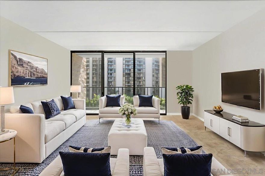 Experience upscale urban living in this stylish one-bedroom condo at Symphony Terrace, perfectly located in the heart of Cortez Hill. Perched on the 4th floor, this home features floor-to-ceiling windows and a private balcony showcasing beautiful east-facing city views. Inside, the open-concept layout offers elegant tile flooring, a dining area, and abundant natural light throughout. The completely renovated kitchen is equipped with recently updated stainless steel appliances—perfect for anyone who enjoys cooking at home. The bathroom has been meticulously remodeled with modern touches.  Symphony Terrace is currently updating the building with impressive upgrades, including a renovated fitness center, refreshed outdoor patio spaces, and updated flooring in the building’s common areas, elevating the community’s overall look and feel. Additional highlights include an in-unit LG front-loading washer and dryer, plus a secured parking space with extra storage.