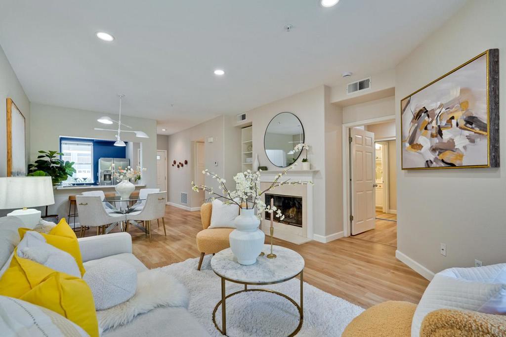 Stunning remodeled 2 bedroom, 2 bathroom ground floor unit in the prime sought-after Fairway Crest community of Sunnyvale features serene golf course views ! This home offers a spacious, open floor plan designed for contemporary living and entertaining. The living and dining room has new light fixture, recessed lights, a cozy fireplace that sets an inviting tone, a wall unit with shelves/drawers and a sliding glass door provides access to the balcony. The remodeled, functional kitchen is equipped to meet your culinary needs, offers quartz countertops, breakfast bar, stainless steel appliances, dishwasher, microwave, abundance of storage drawers and a window showcases exterior views. Enjoy the convenience of inside laundry, with a washer and dryer. Both bedrooms provide ample closet space, versatility for family, guests or a home office. Bathrooms feature new lightings, medicine cabinets, shower/tub doors, and fixtures. Amenities include : private balcony, plenty of storage space all through the unit, A/C, 1 attached garage (very convenient), a dedicated underground parking with storage room, in-ground community pool and spa, HOA covers garbage, both hot and cold water. Convenient location, close to high tech hubs, parks, shops, dining, downtown Sunnyvale, easy access to commutes.