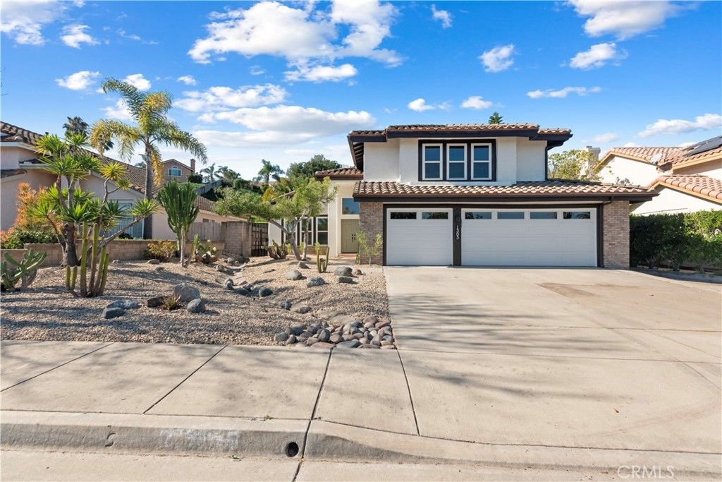 Photo of 1303 Darwin Dr, Oceanside, CA 92056 (MLS # SW26027026)