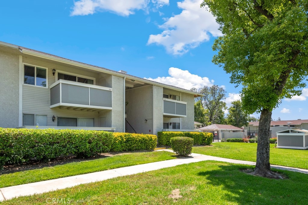 Move in ready 1 bed, 1 bath home located in the desirable Redlands West Townhomes community is ready for its new owner and offers a spacious and open floorplan with new double pane windows and slider, beautiful vinyl wood-look floors, many updates throughout, an attached covered patio, and a carport! The beautifully updated kitchen features quartz counters, breakfast bar seating area, full wall tile backsplash, and in-kitchen dining area. The large bedroom has a walk-in closet, and the bathroom has been updated with a full-size walk-in shower offering a barn-door sliding glass door, and the bathroom vanity also has a quartz countertop. Residents get to enjoy a sparkling pool and spa, tennis courts, and greenbelts. Conveniently located near schools, shopping, dining, and the 10 Fwy. Schedule your tour today!