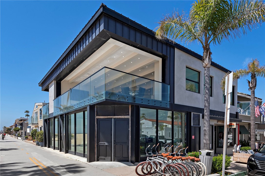Experience luxury beach front living and investment potential with 1504 W Oceanfront, a one-of-a-kind mixed-use property in Newport Beach on the Balboa Peninsula. This premier property spans approximately 7,609 square feet on a 5,000-square-foot corner lot with 100 feet of ocean frontage and breathtaking panoramic views from Newport Pier to Balboa Pier and beyond.
Three residential units with three short-term lodging permits and two commercial spaces, this exceptional five-unit offering blends coastal charm with modern luxury.
The commercial spaces include the iconic “15th Street Surf Shop” retail store and an oceanfront restaurant currently under renovation, formerly known as “The Stuft Surfer”. The three separate residential units consist of a three bedroom residence, a newly built two bedroom residence with an office/bonus room, in addition to a newly constructed one bedroom unit. All three units hold short-term rental permits (SLPs), a rare and valuable asset in Newport Beach. This property is primed for exceptional income generation, with pro forma projections estimating $920,608 in annual gross revenue combined from short-term rentals and commercial leasing.
A standout feature of this estate is its expansive 50x50-foot rooftop deck, one of the largest oceanfront decks on the Balboa Peninsula, offering unparalleled ocean and bay views with endless opportunities for entertainment and relaxation.
1504 W Oceanfront is not just a five-in-one compound; it’s a legacy property that delivers both immediate value and long-term returns in the highly coveted Newport Beach market.