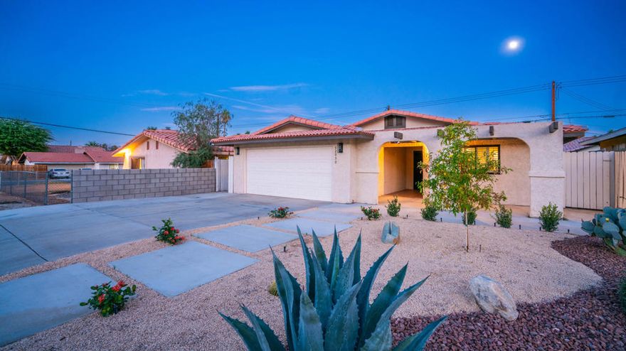 Step into this beautifully updated 3bedroom, 2bath open floor plan home where modern style meets comfort.  Perfect for family living and entertaining.  Inside you will find a modern interior with fresh paint and ceiling fans throughout.  Cozy bedrooms feauture warm laminate flooring,  ceramic tile in living are, kitchen and bathrooms ,  inviting fireplace is perfect for relaxing evenings.  A beautiful kitchen that flows into a coffee station/bar. Spacious backyard, featuring a new custom grill and seating area to enjoy the beautiful mountains and serene desert atmosphere. New Low maintanance landscaping with several citrus fruit trees.  Centrally located near shopping, schools, park, Pickleball, Hiking trails  and the charming Old town La Quinta. This home offers convenience and tranquility. Don't let this one  slip away. Schedule a private tour today!