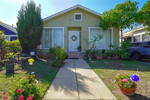Photo of 3415 S gramercy Place, Los Angeles, CA 90018 (MLS # DW26211506)