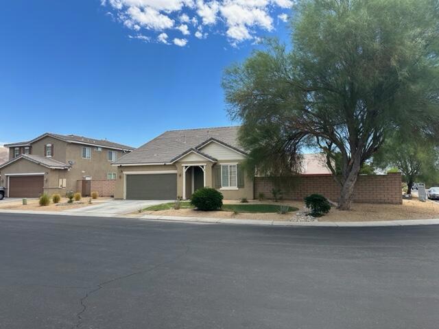 Beautiful property located within the gates of Talavera. The interior boasts an open floorplan with three bedrooms and 2 baths. Additional features include a fireplace, ceiling fans, granite kitchen countertops and much more. Oversized back yard is ideal for entertaining.