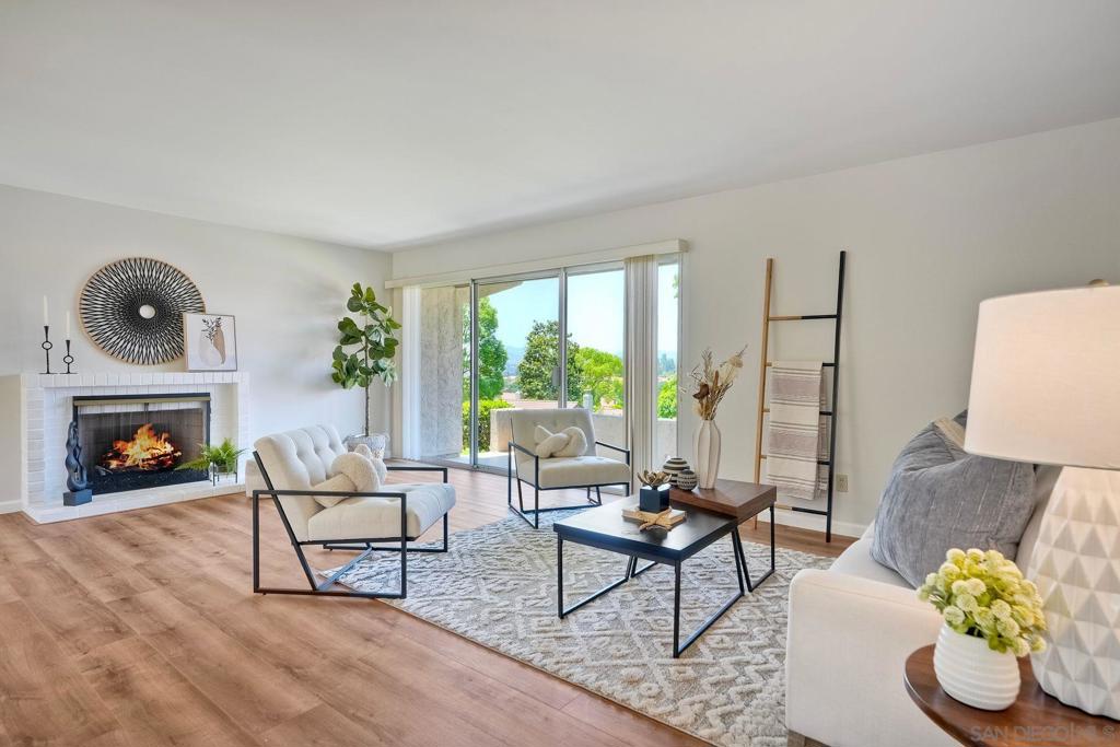 Welcome to this beautifully maintained lower-level condo located in the sought-after 55+ community of Oaks North in Rancho Bernardo. Featuring 2 bedrooms, 2 bathrooms, and a versatile bonus room perfect for a den, office, or optional third bedroom, this home offers comfort, flexibility, and style in an ideal setting. Step inside to discover a bright, open floor plan with fresh paint and elegant luxury vinyl plank flooring. The open floor plan kitchen showcases white cabinetry, a large window above the sink for natural light and a convenient built-in bar eating area. The dining area adjacent to the kitchen opens to a welcoming front patio, ideal for morning coffee, while the living room features a cozy fireplace and a sliding glass door that leads to a private rear patio with views of a lush greenbelt—perfect for relaxing or entertaining.The hallway provides ample storage with a linen closet and an in-unit laundry closet for added convenience. The primary suite boasts two closets, a sink vanity with generous cabinet storage, and a walk-in shower. A single-car detached garage offers a bonus storage area and additional rafter storage with pull-down stair access. Enjoy all the amenities that Oaks North has to offer, including access to the clubhouse, pool and tennis courts. Minutes from Bernardo Winery, several golf courses, restaurants and shopping. Don’t miss this opportunity to embrace relaxed, resort-style living in one of Rancho Bernardo’s most desirable active adult communities!