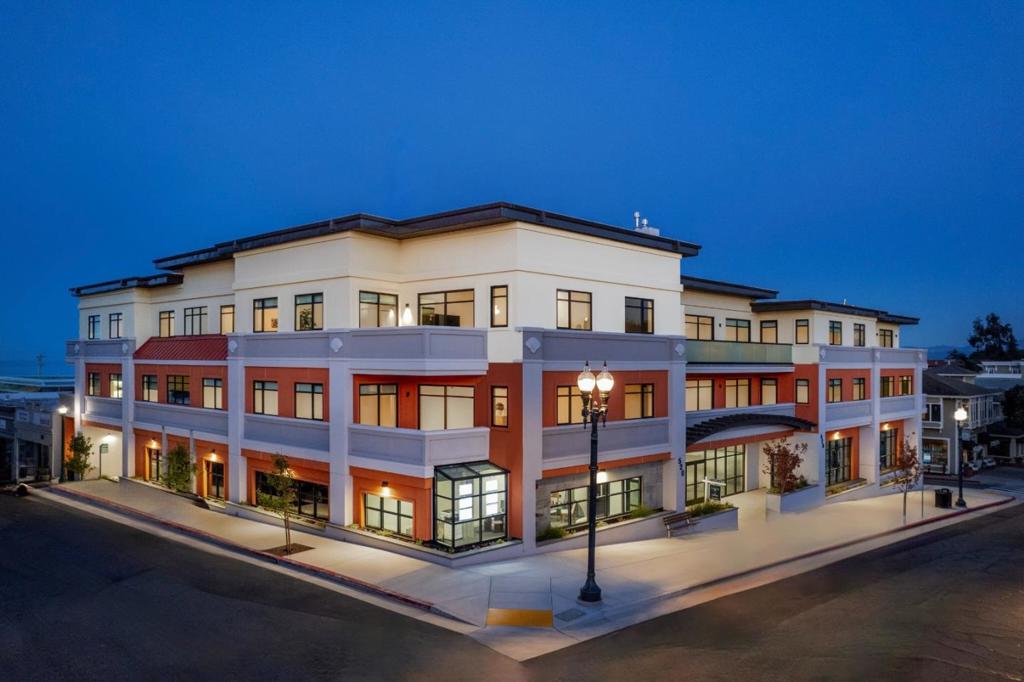 Modern elegance meets coastal charm in this stunning penthouse at 520 Lighthouse-the final available unit in an exclusive collection of just ten newly constructed residences in historic downtown Pacific Grove. This single-level Condo offers approximately 2,400 square feet of sophisticated living space with 2 bedrooms and 2.5 baths. Enjoy an open-concept layout filled with natural light, StudioBecker cabinetry throughout, elegant plaster wall finishes, and precision-engineered windows. The chef's kitchen features Sub-Zero, Cove, and Wolf appliances. Two private balconies offer serene retreats with ocean views. Additional amenities include elevator access, secure underground parking, and private storage. Just steps from shops, restaurants, and the coastline, this rare offering blends timeless design with modern convenience. Dont miss the opportunity to own a premier residence in one of the Monterey Peninsula's most sought-after locations.