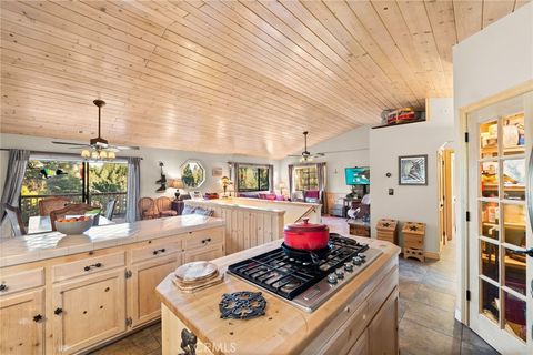 Photo of 2011 Nob Hill Dr, Running Springs, CA 92382 (MLS # CV26048333)
