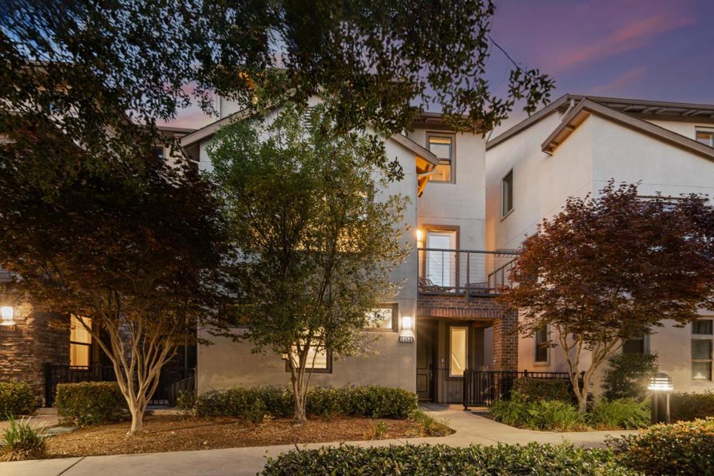 Welcome to 2006 Jubilee Dr, a beautifully upgraded SINGLE FAMILY HOME in the desirable Blackstone community at Cannery. Built in 2017, this 4B4B model home offers ensuite baths for every bedroom & showcases premium finishes, built-in features & thoughtful design. The first floor includes an ensuite bedroom w/ built-in office & direct access to the attached two-car garage. On the main floor, you'll find an open-concept kitchen, dining & living space w/ granite counters, stainless steel appliances, a gas stove, built-in refrigerator & an island w/ an integrated dining table. The living area features custom media cabinets & the guest bedroom exudes a hotel-like feel w/ a built-in bed frame, headboard & nightstands. Upstairs offers two additional bedrooms, including a spacious primary suite w/ a customized walk-in closet system, plus a large laundry room w/ abundant storage. Modern conveniences include pre-wired in-ceiling speakers, Smart door lock, central AC & heating, tankless water heater & pre-wired alarm system. Enjoy a vibrant, family-friendly setting w/ access to Cannery Park, playgrounds, dog park, BBQ areas, walking trails & Burbank Elementary. With easy access to BART, AMTRAK, Hwy 880/92, this home combines comfort, convenience & designer style in one exceptional package.