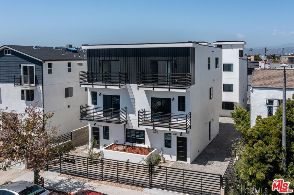 New Stunning Unfurnished 4-Bed, 4.5-Bath townhouse with an insane rooftop deck with Hollywood Hills Views and 2 parking spots on site! Welcome to your brand new home! This exceptional 4-bedroom, 4.5-bath residence offers a perfect blend of luxury, comfort, and breathtaking views of the iconic Hollywood Hills sign. Situated in one of LA's most sought-after neighborhoods, this home provides an unparalleled living experience with modern amenities and stylish finishes throughout.Step inside to discover an open-concept layout with soaring ceilings, abundant natural light, and premium flooring. The kitchen is a cozy delight, featuring high-end stainless steel appliances, sleek cabinetry, and a spacious living room perfect for entertaining. Each generously sized bedroom comes with its own en-suite bathroom, providing privacy and convenience for residents and guests alike.Enjoy the California lifestyle to the fullest with private balconies offering stunning panoramic views, ideal for morning coffee or evening relaxation. Additional highlights include a dedicated laundry area, ample storage space, and designer details that elevate the home's sophisticated ambiance. 2 parking spots on site and easy access to top dining, shopping, entertainment, and major freeways, this property is perfect for those seeking both convenience and luxury. Don't miss your chance to lease this incredible home schedule a private showing today!