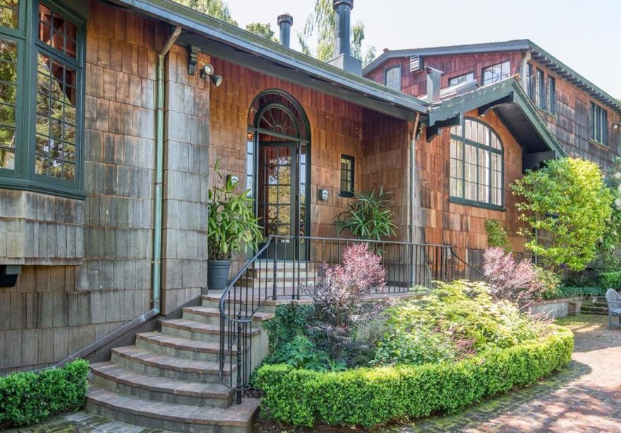 If you viewed this property a year ago you must go back and see the dramatic difference.  This classic Craftsman blends original architectural detail with sophisticated, modern luxury.. Don't miss the 1bd/1ba cottage & 2bd/1ba gatehouse.   Enchanting gardens w/walking paths and quiet spots for meditation abound on over 2 ac. Take the time to walk the property, you will be glad you did. Ample parking at end of driveway. Plenty of flat lawn for play. Former home of the Lilienthal family of Levi Strauss