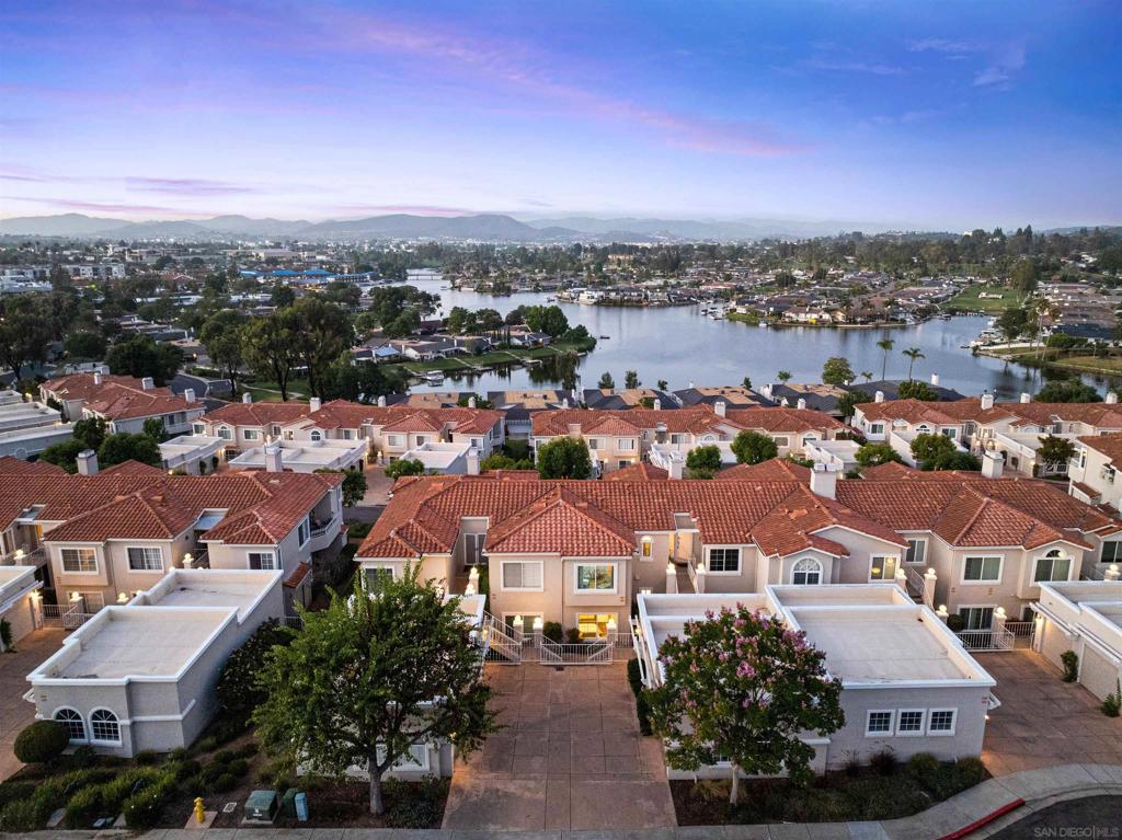 Welcome to your everyday getaway in the coveted Panorama community at Lake San Marcos! This 2-bedroom, 2-bath condo offers breathtaking views of the lake and mountains -- enjoyed right from your kitchen, dining area, living room, primary suite, and expansive private patio. Unwind by the cozy fireplace as you watch the water views. The home includes in-unit laundry, a detached garage, and an ideal layout for entertaining and privacy from the bedrooms. Just a short stroll to the Lakehouse Resort, golf course, Sail Club, Amalfi Restaurant, and community pool, this home gives y9ou access to all the amenities that make Lake San Marcos a true lifestyle destination. Everyday will feel like you're on vacation! Welcome to your everyday getaway in the coveted Panorama community at Lake San Marcos! This 2-bedroom, 2-bath condo offers breathtaking views of the lake and mountains -- enjoyed right from your kitchen, dining area, living room, primary suite, and expansive private patio. Unwind by the cozy fireplace as you watch the water views. The home includes in-unit laundry, a detached garage, and an ideal layout for entertaining and privacy from the bedrooms. Just a short stroll to the Lakehouse Resort, golf course, Sail Club, Amalfi Restaurant, and community pool, this home gives y9ou access to all the amenities that make Lake San Marcos a true lifestyle destination. Everyday will feel like you're on vacation!