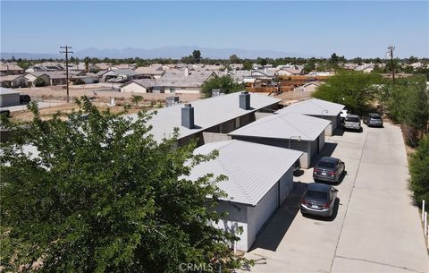 Photo of 13428 Mohawk Road, Apple Valley, CA 92308 (MLS # CV25112625)