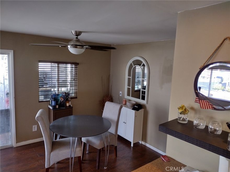 This thoughtfully updated mobile home is located in one of the most desirable 55+ parks in Canoga Park. Featuring a well-designed layout and numerous recent upgrades, this home offers comfort, functionality, and style.

Recent improvements include a new water heater, A/C compressor, and complete HVAC system, as well as modern PEX plumbing. The kitchen and bathroom have been tastefully remodeled, and a new garbage disposal has been installed for added convenience. The owner just had the interior freshly painted.

The spacious laundry room offers ample space for storage or can be easily converted into a home office and has a door leading to the large backyard. Additional features include recessed lighting, ceiling fans in select rooms, and dual-pane windows throughout most of the home. Both the walls and ceiling are insulated with R-13 insulation for enhanced energy efficiency and comfort.

Many of the electrical outlets are equipped with built-in USB ports, perfect for charging your devices with ease. Outside, the large backyard provides plenty of space to relax or entertain. The exterior is equipped with three motion-sensor floodlights for added security and peace of mind.

The interior walls and ceilings are finished with drywall, giving the home a modern, residential feel. A well-lit shed with an electric outlet adds even more functionality to this already impressive property.

It’s clear this home has been lovingly maintained and is ready for its next chapter.