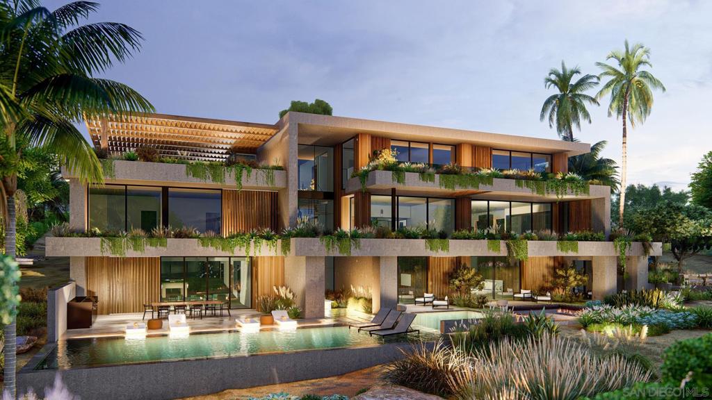 Located in the heart of Foxhill La Jolla, the newest and most exclusive, private coastal community, this extraordinary property with fully-approved CDP includes a soon-to-be-built exquisite residence set on a 31,147-SF lot and offering stunning ocean views. The proposed residence is a 13,000-square foot modern sanctuary that seamlessly blends bold urban design with lush tropical vitality. This 7-bedroom, 8.5-bath retreat showcases a dynamic interplay of geometry and nature, with cascading greenery softening its striking, minimalist concrete architecture. Layered overhangs, brimming with vibrant plants, imbue the home with an organic energy, making it feel both commanding and alive. To compliment the raw concrete, warm wood accents are elegantly woven into the design. Vertical slats and detailed paneling lend a tactile richness, softening the home’s aesthetic while reinforcing its connection to the natural environment. These elements create a welcoming warmth, transforming the modernist lines into an inviting and livable space. Expansive glass walls blur the boundaries between indoors and out, allowing natural light to flood the interiors while framing unobstructed views of the surrounding greenery. Each level offers new discoveries, from shaded terraces to overhanging outdoor spaces embraced by tropical foliage. The design achieves a rare harmony between urban sophistication and natural beauty. The home’s plans also feature a gym, movie room, and entertainment/bar space, including a back kitchen/pantry and laundry/mudroom, and a 3-car garage.