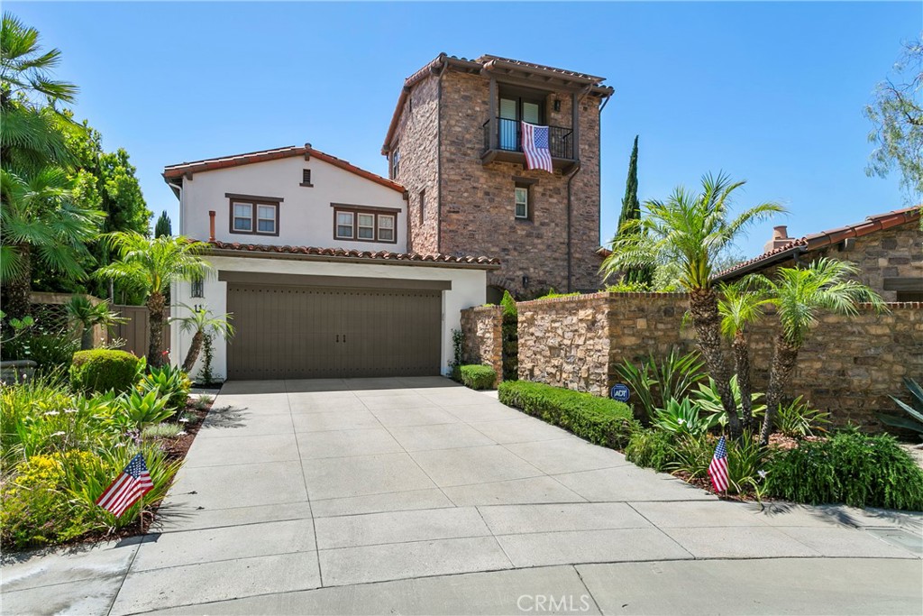 PANORAMIC VIEWS!!! Welcome home to 11 Sandalo Court, nestled in the prestigious guard-gated community of Covenant Hills. This meticulously remodeled property promises to captivate you with its breathtaking panoramic sunset views and generously sized pie-shaped lot, offering ample space for your every need.
As you step inside, you're greeted by stunning 9-inch wide hardwood floors that radiate warmth and comfort. A private office or guest room, complete with elegant French doors, frames serene vistas and features an en-suite bathroom for added convenience. The home is enhanced by custom cabinetry and lighting designed to maximize functionality and style in every corner.
The expansive open-concept kitchen is a chef's dream, boasting exquisite countertops, top-of-the-line appliances, a beverage station, and a walk-in pantry. A hidden laundry and su-kitchen offers additional storage and functional space that will impress even the most discerning homeowner.
Soaring ceilings adorned with stained beams add a touch of grandeur, while the family room features a statement fireplace and stunning built-in cabinetry. French doors seamlessly connect this space to a covered outdoor living area, where you can enjoy exquisite views.
The spacious formal dining room is perfect for entertaining, opening onto a tranquil outdoor setting with a beautiful fountain, cozy fire pit, BBQ area, and inviting seating arrangements.
Upstairs, you'll discover two generously sized secondary ensuite bedrooms, each designed to provide comfort and privacy. The third level boasts a versatile loft space—ideal for an office, gym, or playroom.
This beautiful, energy-efficient home is situated at the end of a quiet cul-de-sac, featuring a long driveway that enhances privacy and curb appeal. Experience a lifestyle of luxury and serenity at 11 Sandalo Court, where every detail has been thoughtfully considered to create your perfect sanctuary.