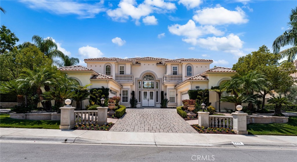 OH GARDENIA...IT'S LOVE AT FIRST SIGHT!!! Perched high in Vista Del Verde’s Pinnacle Estates, this Magnificent TOLL BROTHERS LUXURY HOME offers expansive indoor-outdoor living across 5,252 sq.ft. with COMMANDING VIEWS of the surrounding citycape. The refined main level features a coveted foyer with SWEEPING DOUBLE STAIRCASE that WOW!!! A luminous formal dining, and a sprawling great room combining the GRAND ISLAND kitchen, family space, and casual dining. Enjoy the BREATHTAKING VIEWS in the open terraced, professionally landscaped gardens showing off SPECTACULAR NIGHTLY SUNSETS. Beat the heat as you bask in the refreshing pool and spa overlooking the SPRAWLING PANORAMIC VIEWS. The GRAND and SPACIOUS PRIMARY SUITE includes even MORE IMPRESSIVE STUNNING VIEWS!!! The 4 additional bedrooms each include new plush carpet and their own private baths. A versatile office/den adds flexibility to create into your own liking. Enjoy 3 warming fireplaces throughout. A total of 4-CAR GARAGE strategically placed to give this SPECTACULAR MEDITERRANEAN TURNKEY HOME IT'S GRAND AND MAJESTIC PRESENCE!!! Lookout for the open house coming soon.