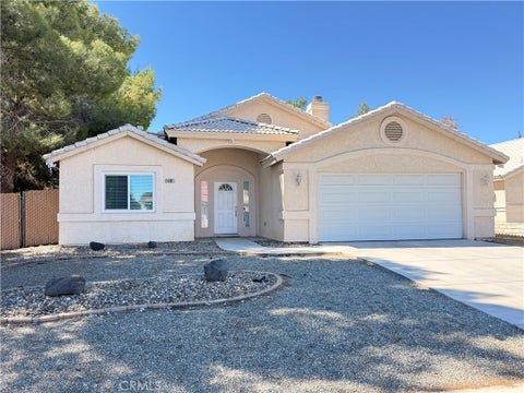 Photo of 15681 Kingswood Drive, Victorville, CA 92395 (MLS # IV26216313)