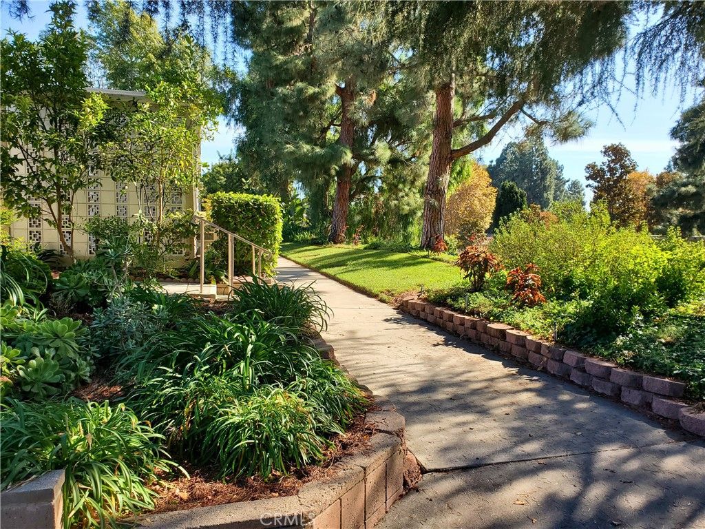 Photo of 422 AVENIDA CASTILLA #D, Laguna Woods, CA 92637 (MLS # OC26013324)