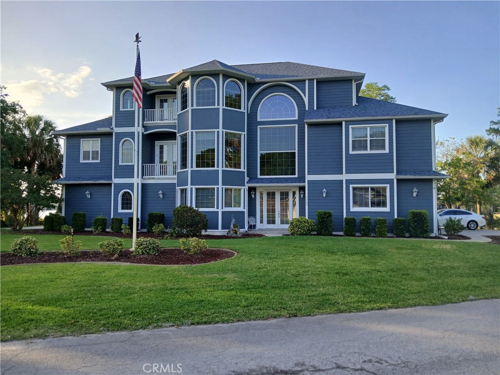 Custom built 3 story home designed just for us. Located on a private island along with 11 other homes. Designed for easy living. It is not a fancy showy cold/modern designed home. It is warm and comfortable to live in even being a large as it is.
We love the location. Located on a private island entered by driving down a private, gated 1/4 mile long tree lined curvy causeway to our home. We feel so isolated here from all the hustle and bustle and yet we are only 3 miles from down town Inverness. My wife loves the large kitchen and laundry room. We both love the view from our large windows. The house is built angled on the lot so the back faces almost due North eliminating most of the West Sun in the evening. Our neighbors are all great and we have neighborhood get togethers quite often.