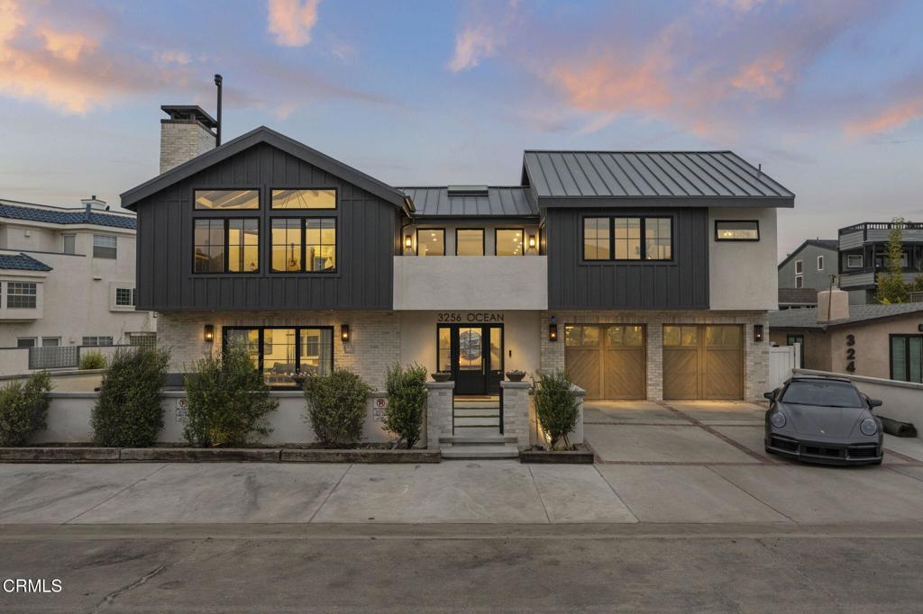 Exceptional & Rare Extra-Wide Corner-Lot Duplex with Direct Beach Access & Sweeping Ocean ViewsHOLLYWOOD BEACH - Perfectly positioned on a coveted extra-wide corner double lot just steps from the sand, this rare legal duplex offers breathtaking ocean and harbor views from one of California's most prestigious coastal addresses. Recently reimagined in a high-design remodel, it blends relaxed coastal sophistication with the refinement of a luxury estate.Featuring 5 bedrooms, 4.5 bathrooms, an expansive rooftop deck, and an oversized 4-car garage plus additional parking, this residence delivers a lifestyle without compromise.Lower Level - Private 2-bedroom, 2-bath suite with living area, sleek modern kitchen, and state-of-the-art infrared sauna. Expansive multi-slide glass doors open to a large front patio--ideal for guests, extended family, or premium rental income.Upper Level - Open-concept living, dining, and gourmet kitchen anchored by an oversized island for six, slim shaker cabinetry, RO water system, 48'' Wolf gas range, 60'' Sub-Zero refrigerator, and Wolf microwave drawer. Walk-in pantry plus wet bar with wine fridge, instant hot water, and filtration elevate entertaining. Vaulted wood-beam ceilings, gas/wood-burning fireplace, and ocean views from the living room, kitchen, dining area, primary suite, and even the spa shower define the space. Three additional bedrooms, two full baths, and a powder room provide ample accommodations.Primary Suite - Private balcony, spa-inspired bath with dual shower, deep soaking tub, dual-sink vanity, and walk-in closet.Outdoor Living - Dining balcony leads to an expansive rooftop deck where panoramic ocean and harbor views frame unforgettable sunsets, sunrises, fireworks, and whitewater horizons.Wellness & Comfort - Second-story central A/C with Purifi ion generator and air quality monitoring, whole-house water softening and carbon filtration, infrared sauna, and rooftop hot tub with ozone filtration create a true mind-body-spirit sanctuary.Additional Upgrades - New Marvin casement windows throughout, new metal roof, and custom-designed carriage-style garage doors.With its premier location, reimagined interiors, direct beach access, and wellness amenities, this home embodies the pinnacle of Southern California coastal luxury--ideal as a primary residence, exclusive retreat, or investment.