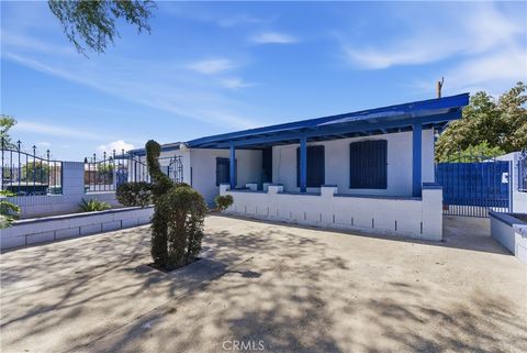 Photo of 715 Van Wig Ave, La Puente, CA 91746 (MLS # DW26089916)