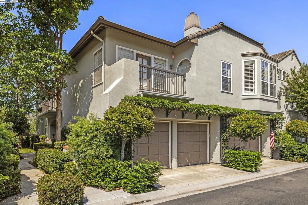 Remodeled Turn-Key Home in Prestigious Newport Coast. This end-unit gem in the gated Summit community offers a rare blend of style, comfort, and convenience—perched high in the hills of Newport Coast. Recently remodeled from top to bottom, this bright, open home features vaulted ceilings, abundant natural light, and an easy ground-level entry. The main floor is designed for seamless living and entertaining, with an open flow between the living room, family room, dining area, and gourmet kitchen. A versatile den on this level can be used as a third bedroom, complete with a full bath—ideal for guests or extended family. Upstairs, you’ll find two private bedrooms, each with its own en-suite bath, large walk-in closet, and private balcony. The laundry room, thoughtfully located inside the home, includes a full sink for added convenience. Improvements include, White oak flooring, Marble tile, New windows and patio doors, Quartz countertops, Updated plumbing, Water softener system, LED lighting, Tesla EV charger, Garage openers and more. HOA benefits include access to the Summit’s pool and spa, plus the nearby Newport Ridge Community Park with tennis courts, basketball courts, playground, and picnic areas. This home is truly move-in ready—perfectly updated and ideally located.